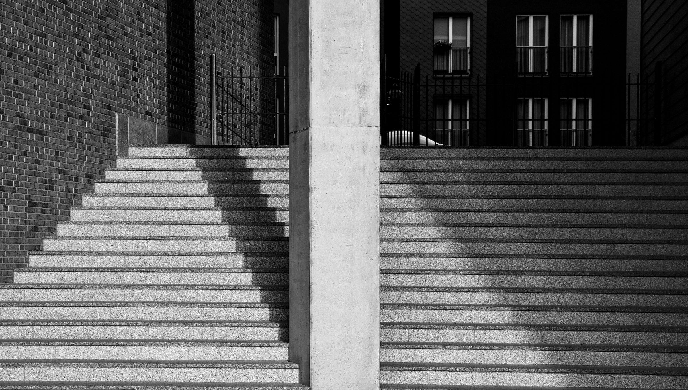 A symmetrical flight of steps between columns